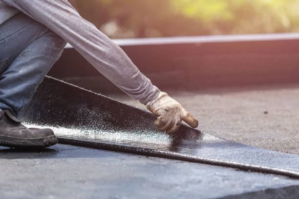 Professional Basement Waterproofing technician working in Concord, NC